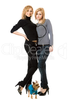 Two beautiful young women with dog