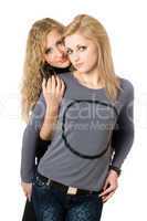 Portrait of two attractive young women. Isolated