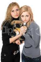 two pretty young women with pekingese