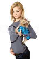 Beautiful blonde posing with puppy. Isolated