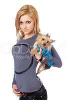 Pretty blonde posing with puppy. Isolated