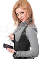 Portrait of shocked blonde with smartphone