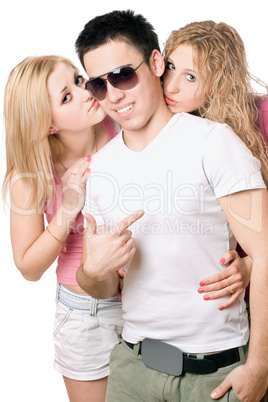 Two attractive blonde kissing young man