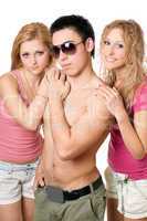 Two pretty blond women with young man