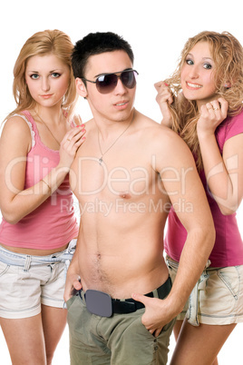 Two smiling beautiful blond women with young man