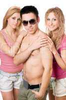 Two attractive blonde women with young man