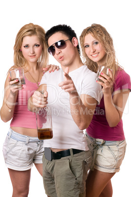 Joyful young people with a bottle of whiskey