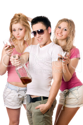 Cheerful young people with a bottle of whiskey