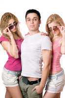 two beautiful blonde women with handsome young man