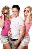 two blonde women with handsome young man