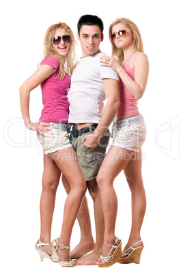 Handsome young man and two girls. Isolated