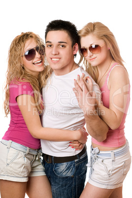 two joyful women and handsome young man