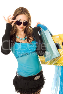 Playful young woman after shopping. Isolated on white