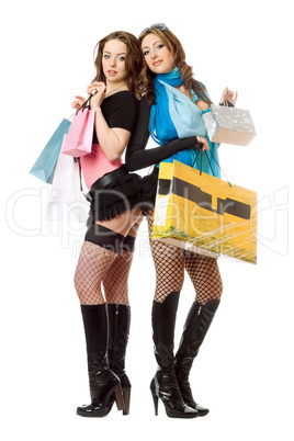 Two attractive young women after shopping