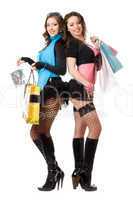 Two sexy young women after shopping