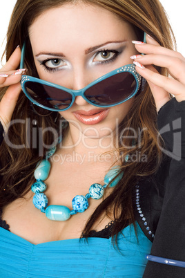 Closeup portrait of young woman in sunglasses