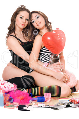 Two lovely young girlfriends. Isolated