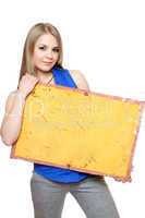Lovely young woman posing with yellow vintage board