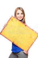 Smiling young woman posing with yellow vintage board