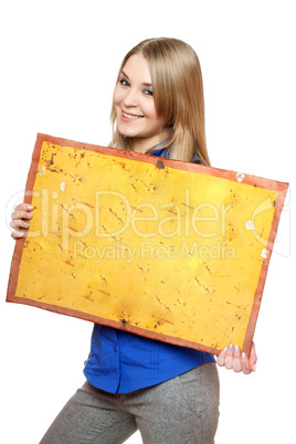 Cheerful young woman posing with yellow vintage board