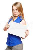 Serious young woman holding empty white board