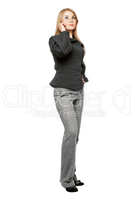 Serious young woman in a gray business suit