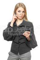 Portrait of thoughtful young blonde in a gray business suit