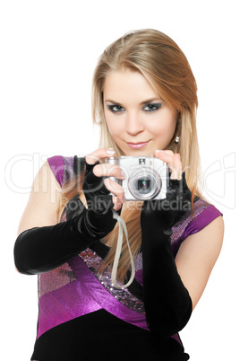 Attractive blonde holding a photo camera. Isolated