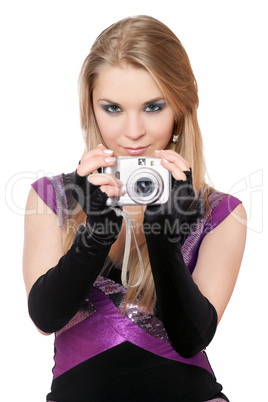Young attractive blonde holding a photo camera. Isolated