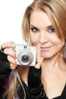 Smiling beautiful blonde holding a photo camera