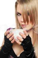 Pretty young blonde with a cup of tea