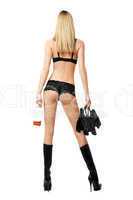 Sexy blonde with handbag and bottle in her hands