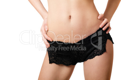 Sexy belly of young woman. Isolated