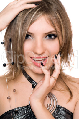 Portrait of a smiling beautiful young woman. Isolated