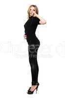 Sensual young woman in leggings. Isolated