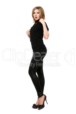 Pretty young woman in leggings. Isolated on white