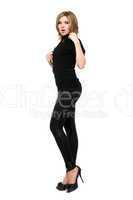 Pretty young woman in leggings. Isolated on white