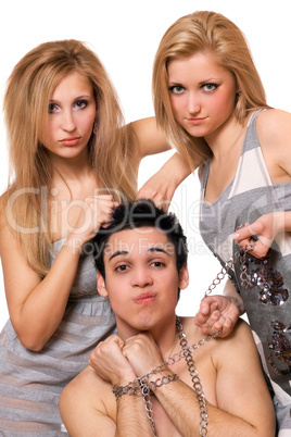 Two pretty blonde and a guy in chains