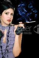 Portrait of a brunette with cigarette holder