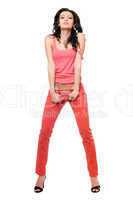 Playful young brunette in a red jeans