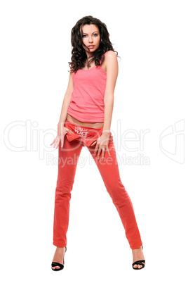 Attractive young brunette in a red jeans