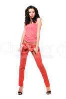 Attractive young brunette in a red jeans