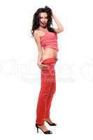 Playful pretty young brunette in a red jeans