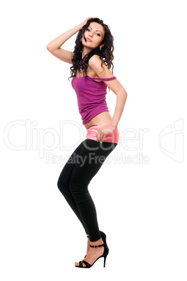 Seductive young brunette in a black leggings