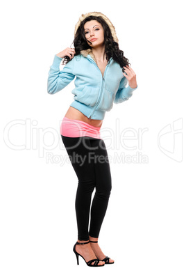 Pretty young brunette in a black leggings. Isolated