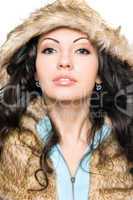 Portrait of perfect young brunette in the hood