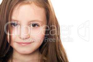 Closeup portrait of pretty little girl. Isolated