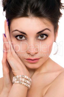 Closeup portrait of lovely young brunette. Isolated
