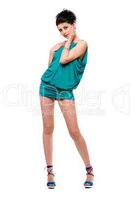 Pretty young woman in a blue dress. Isolated