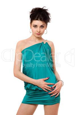 Portrait of sexy young woman in a blue dress
